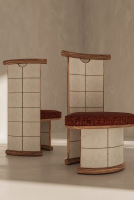Art Deco chairs with geometric pattern and red cushions