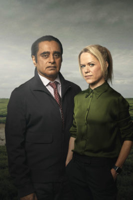 SANJEEV BHASKAR as DI Sunny Khan and SINEAD KEENAN as DCI Jess James in Unforgotten series 6.