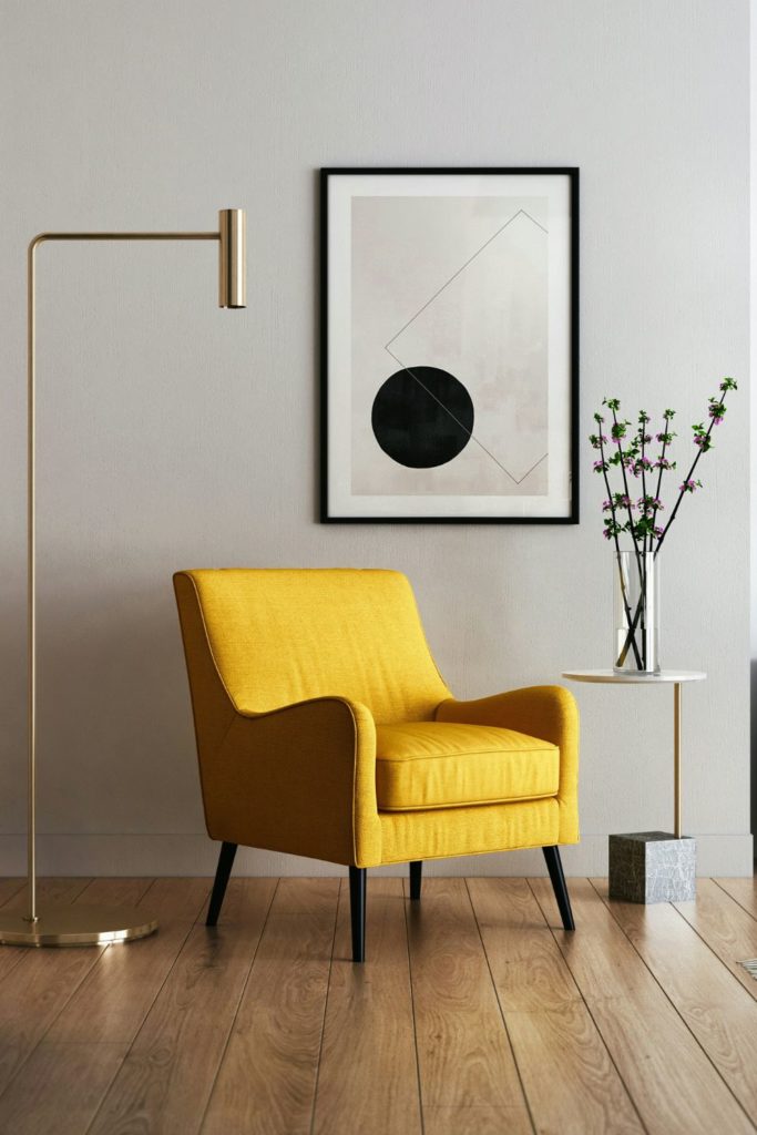 Living room with bright yellow armchair