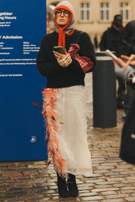 Woman wearing multi-coloured bonnet