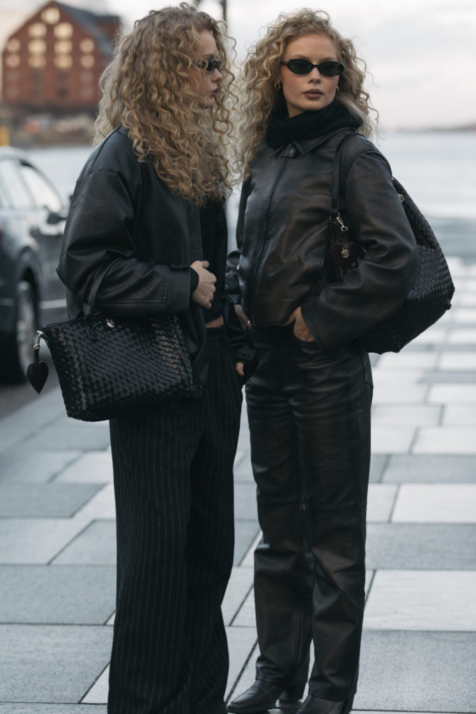 Two women with librarian cut hairstyles