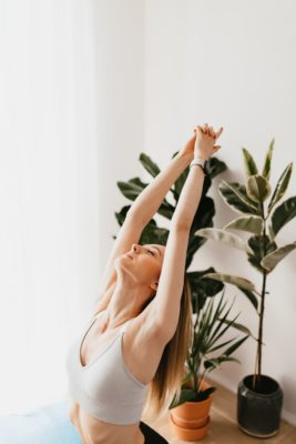 Woman doing yoga before sleep