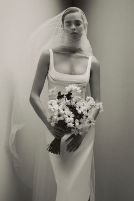 Woman in Emilia Wickstead veil and bridal gown
