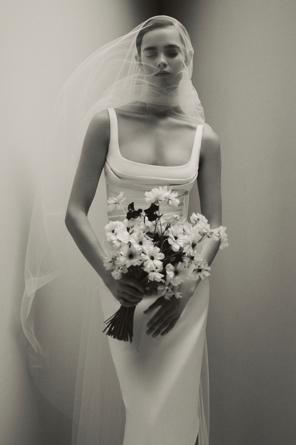 Woman in Emilia Wickstead veil and bridal gown