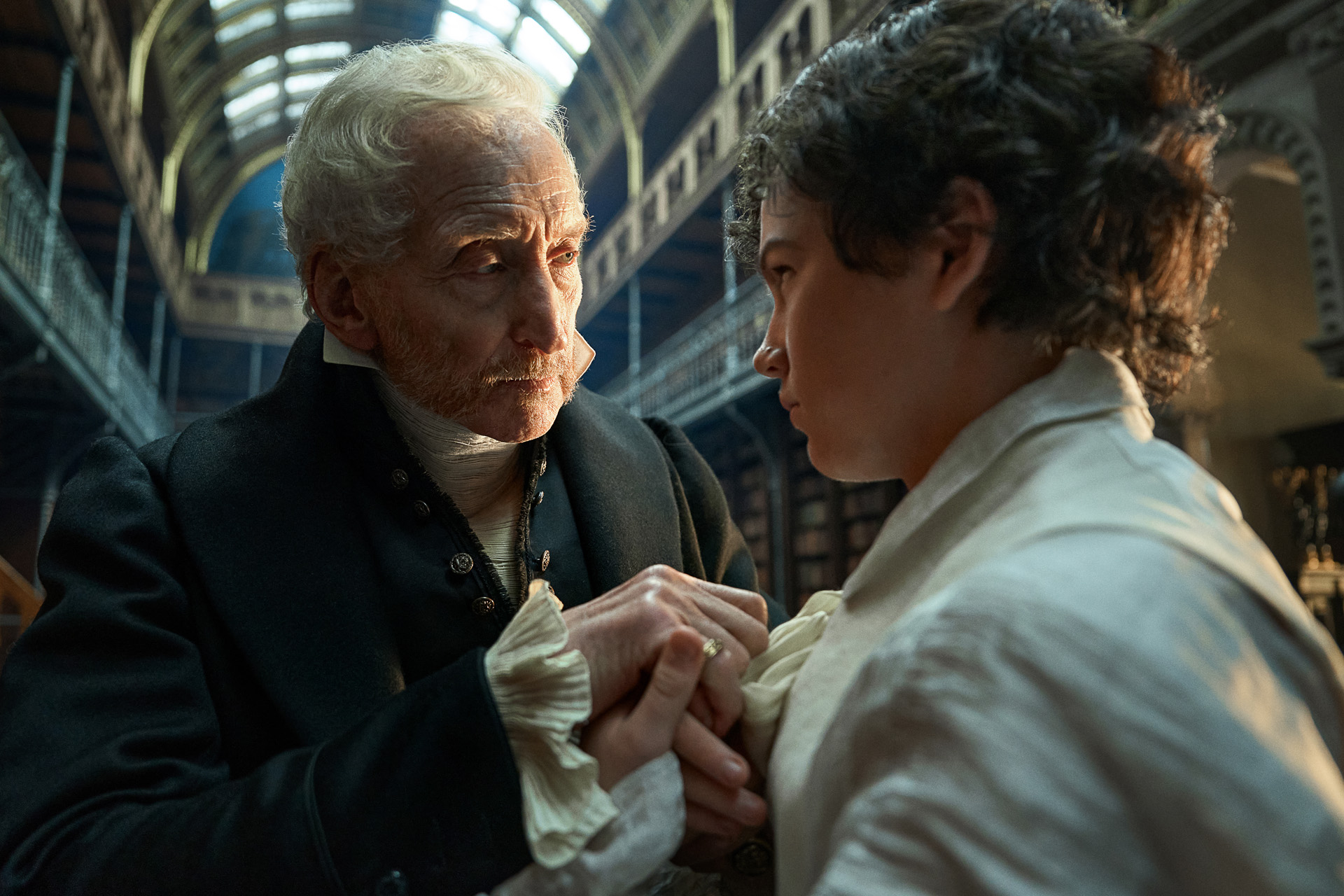 Charles Dance as Leopold Frankenstein and Christian Convery as Young Victor in Frankenstein