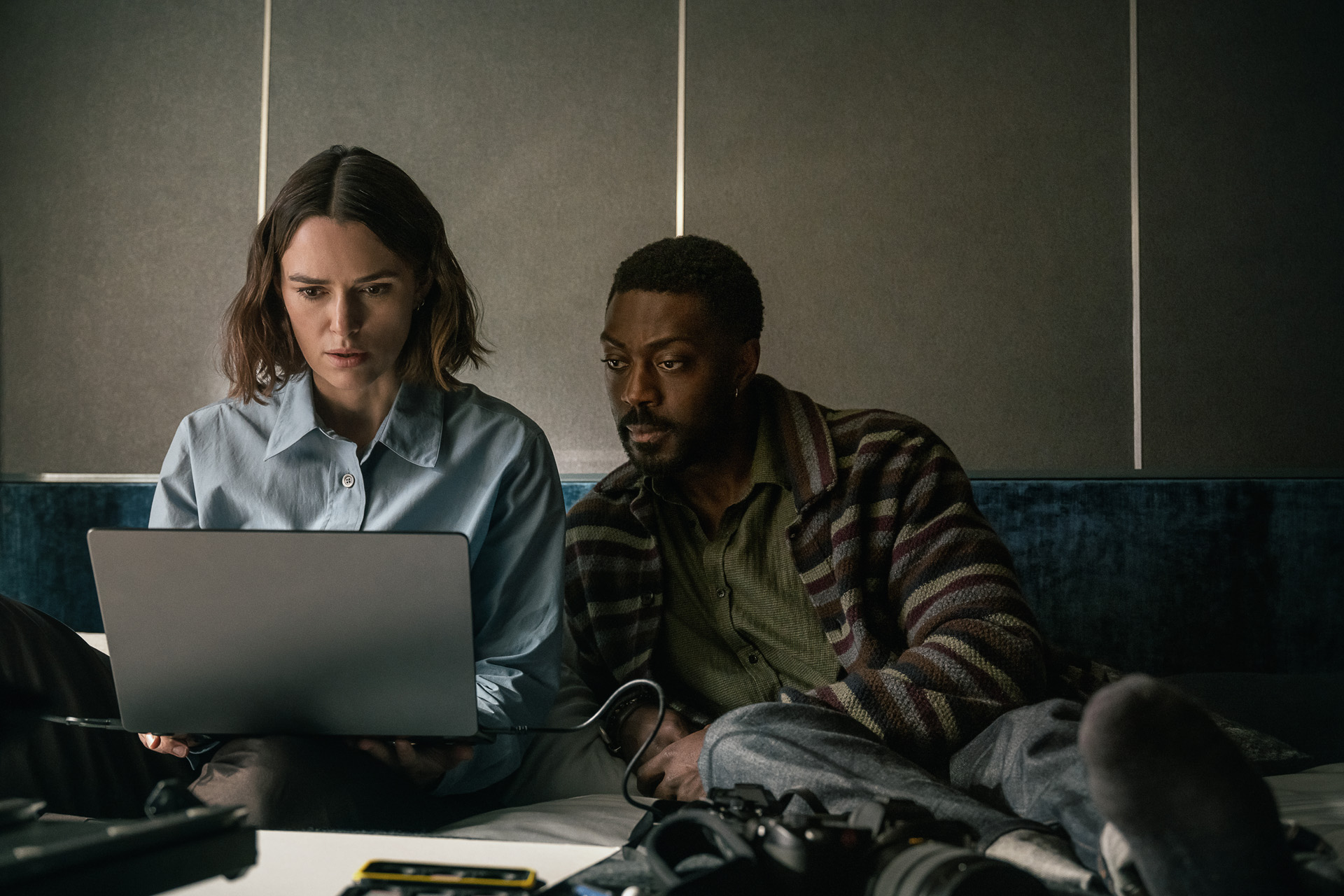 (L-R) Keira Knightley as Lo and David Ajala in The Woman in Cabin 10