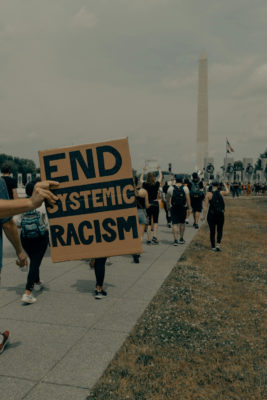People march towards the Washington Monument at the Black Lives Matter protest in Washington DC
