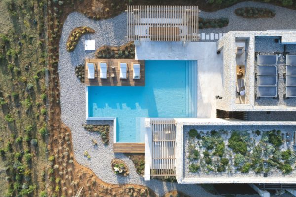 Aerial view of luxury bioclimatic villas with an outdoor pool, terrace and roof garden