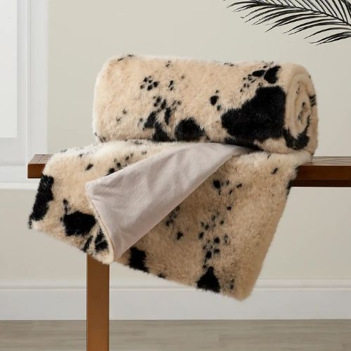 Fluffy cow print throw