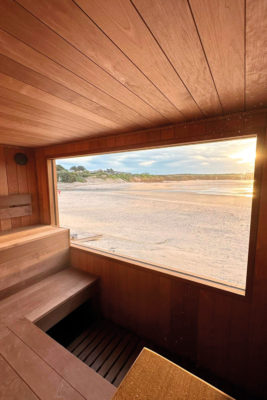 A sauna looking out to sea
