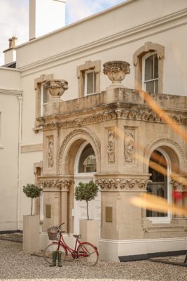 Exterior of Georgian country house with a bicycle outside