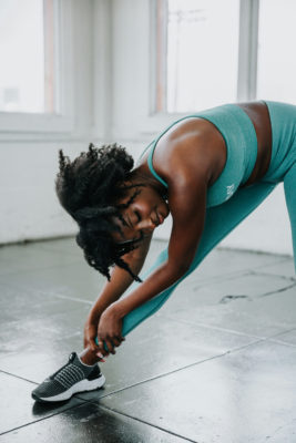 Woman stretching at the gym