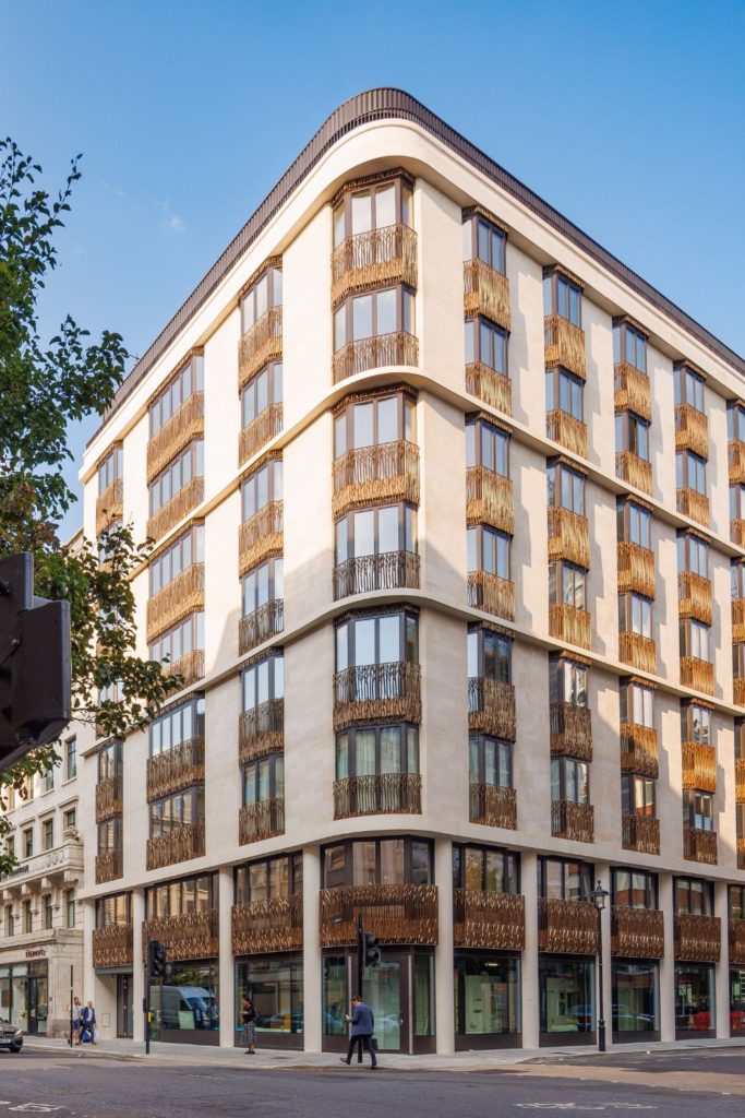 W1 Place exterior, with Portland stone, wrought aluminium balustrades and large gay windows.