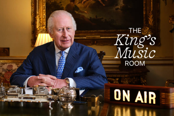 The King beside an 'on air' sign