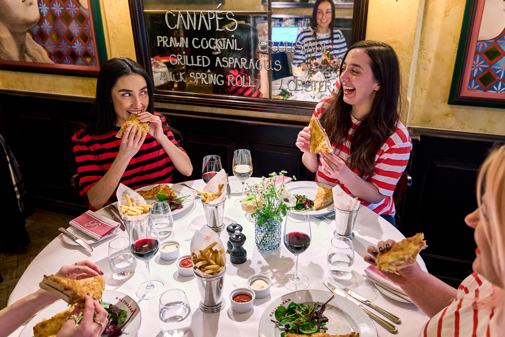 Two people enjoying a Croque Monsieur