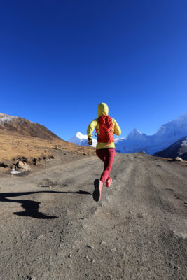 Woman running in the mountains
