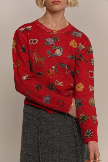 Woman in red patterned cardigan