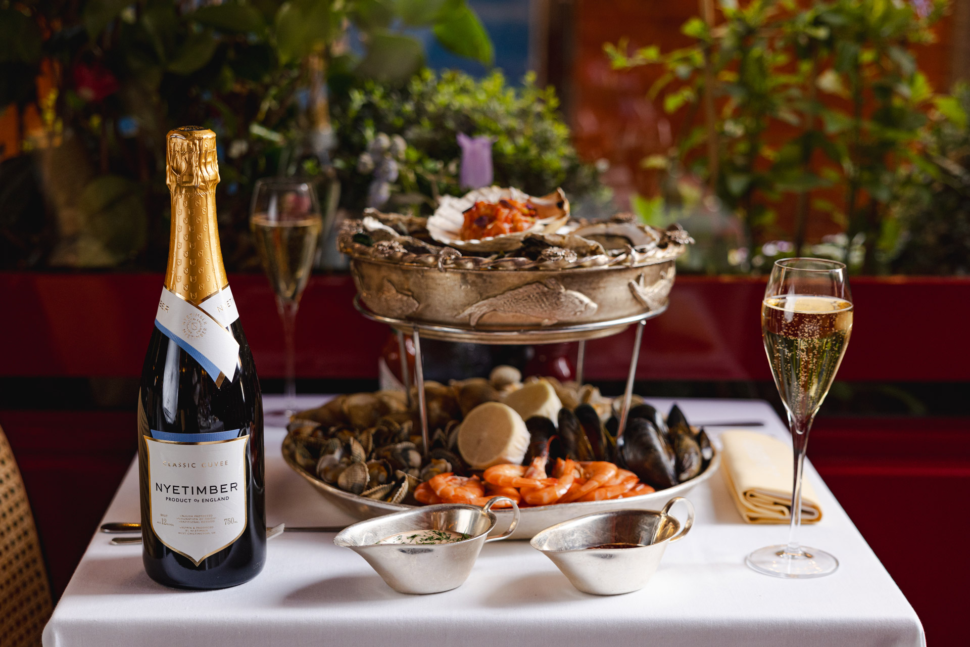 Nyetimber bottle and a seafood plate
