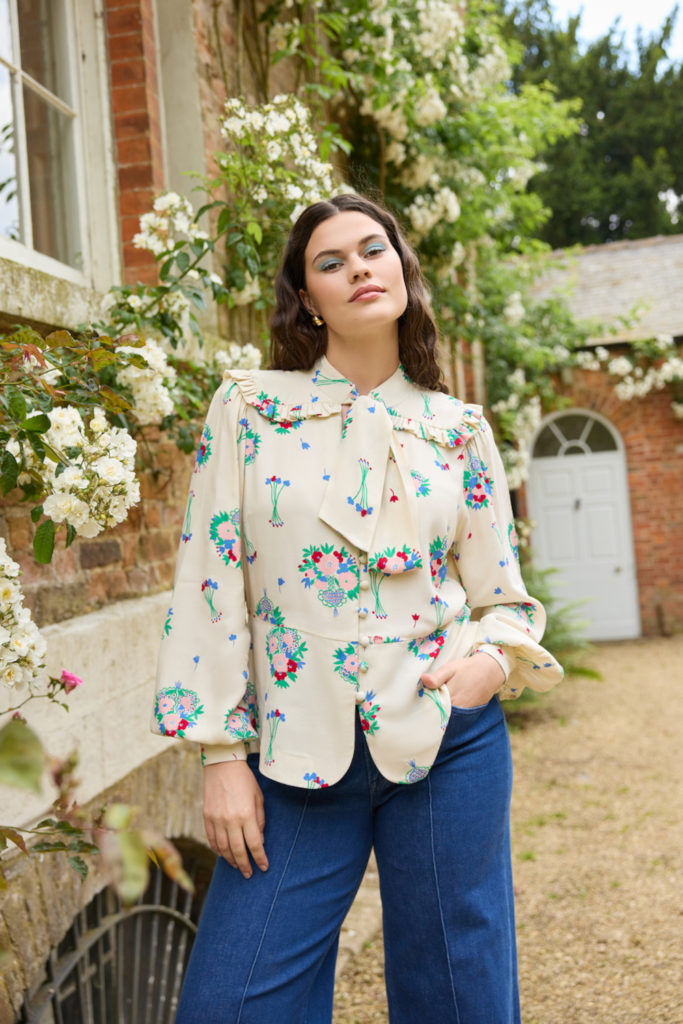 Woman in patterned blouse | British Luxury News March 2025