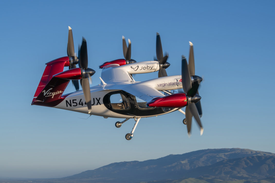 Joby’s all-electric air taxi in flight above the company’s flight test facility in Marina, California