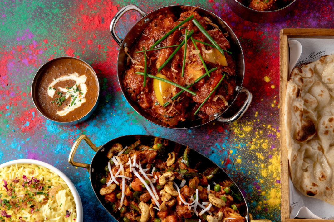 Indian food against a colourful background