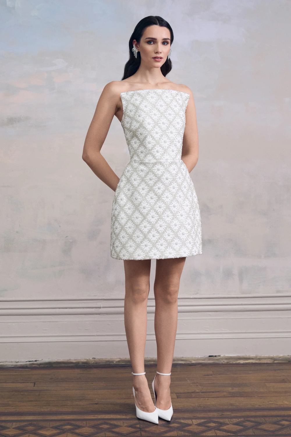 Woman in white mini dress