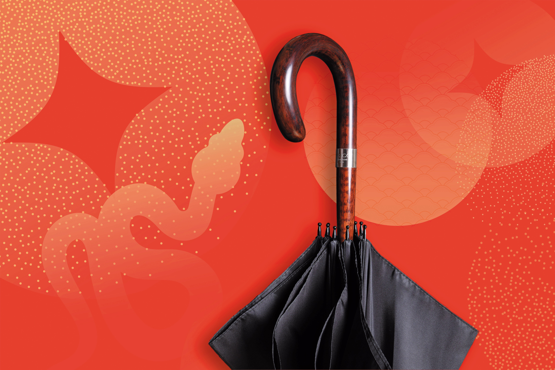 Umbrella on red background