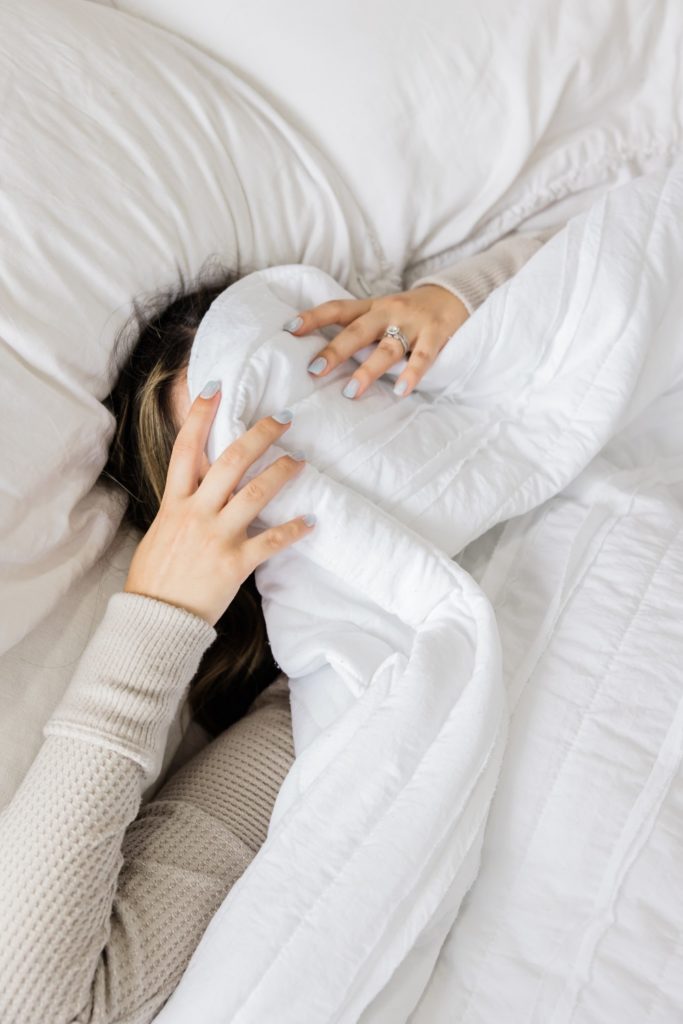 Person covering face | Traditional Chinese Medicine sleep