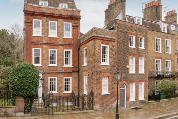 Red brick Georgian townhouse with garden beside