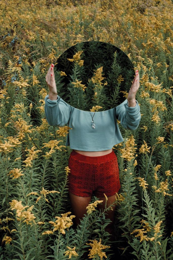 Woman in a field of flowers