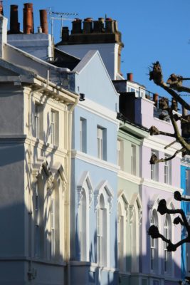 Pastel-coloured townhouses in Notting Hill