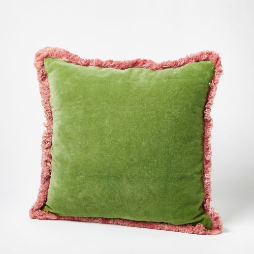 Mossy green velvet cushion with rose pink fringe trim