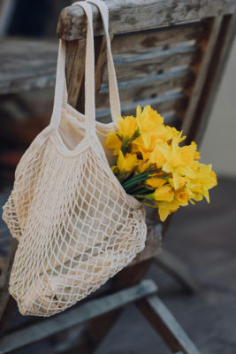 A bunch of Daffodils in a tote bag