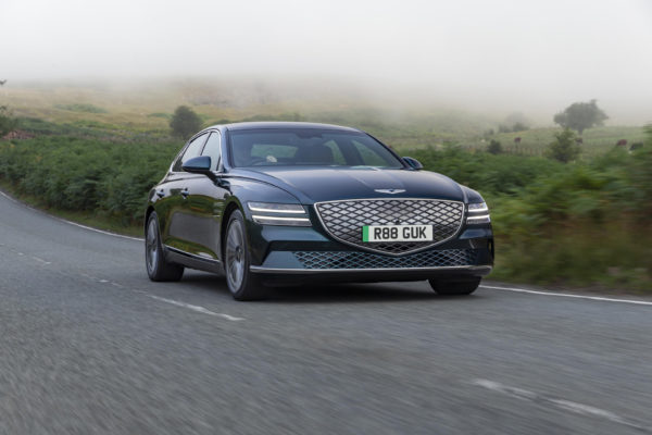The Genesis Electrified G80 on a country road