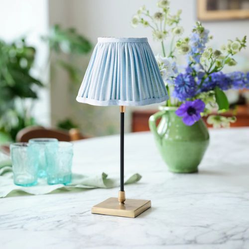 Slim table lamp with brass base and blue shade