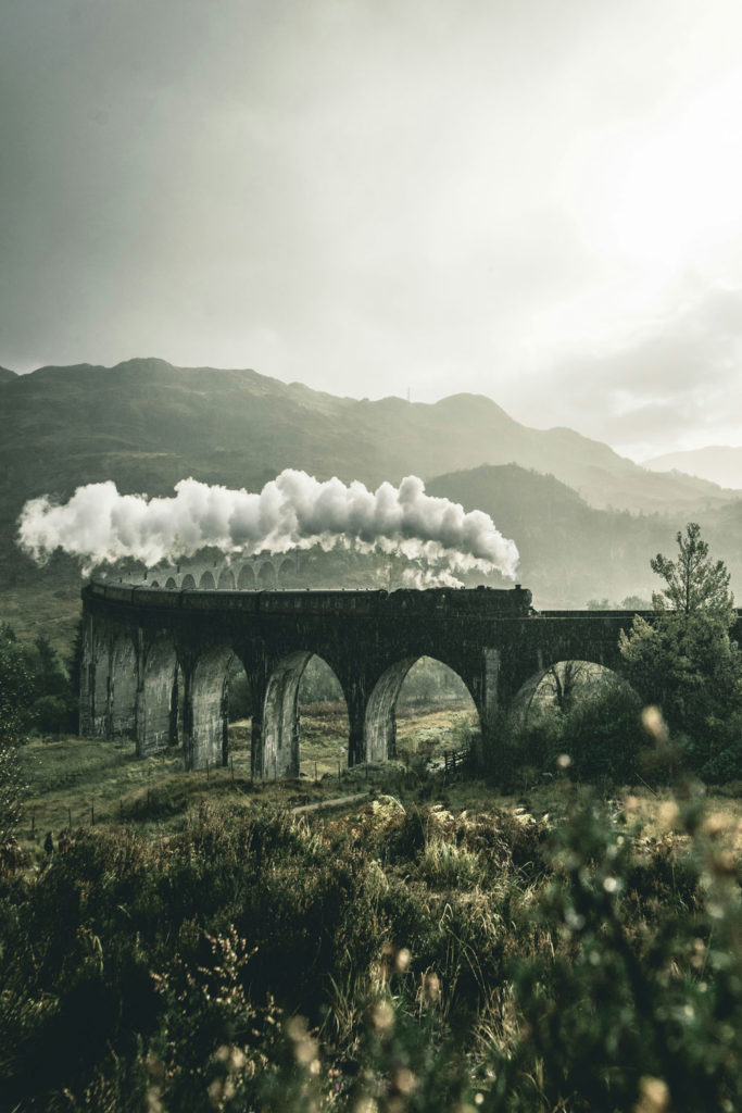Steam train on a bridge