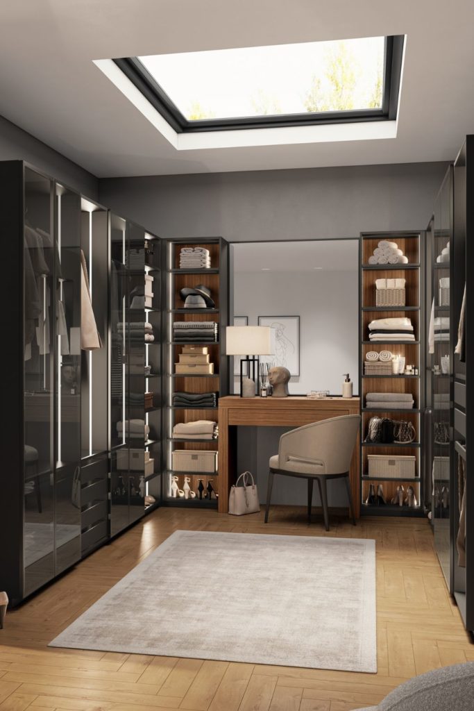 Bedroom with fitted wardrobes and a built-in desk space