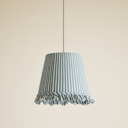 Green and white stripe lampshade with ruffle trim