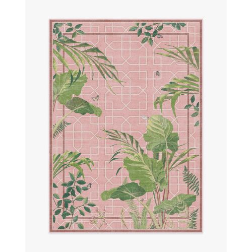 Pink rug with Art Deco-style white pattern and green botanical details