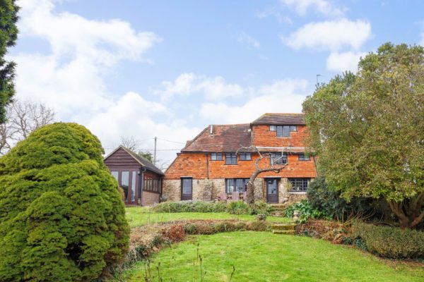 Large brick cottage with long garden