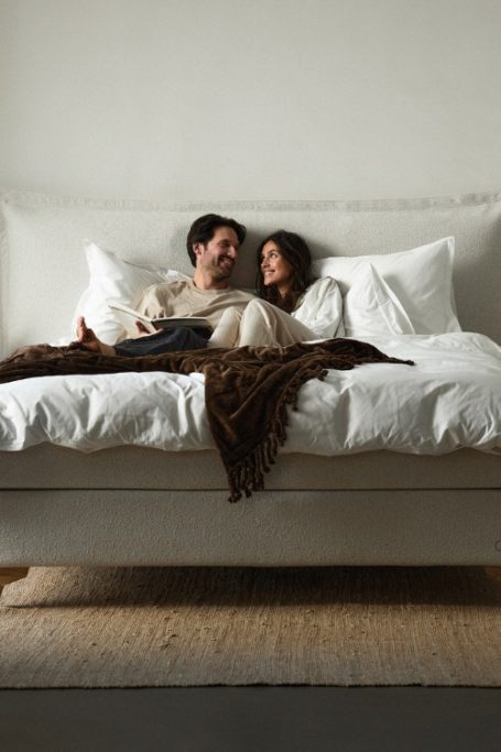 Man and woman in bed together