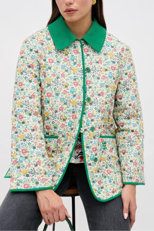 Woman wearing floral joy jacket