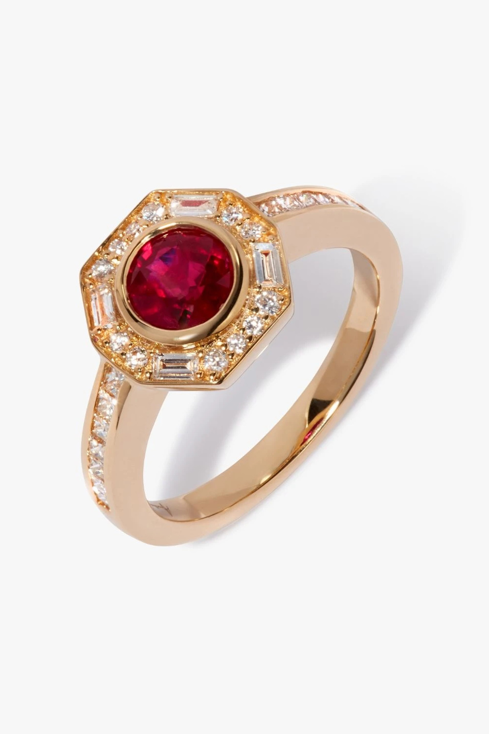 Gold ring with red stone