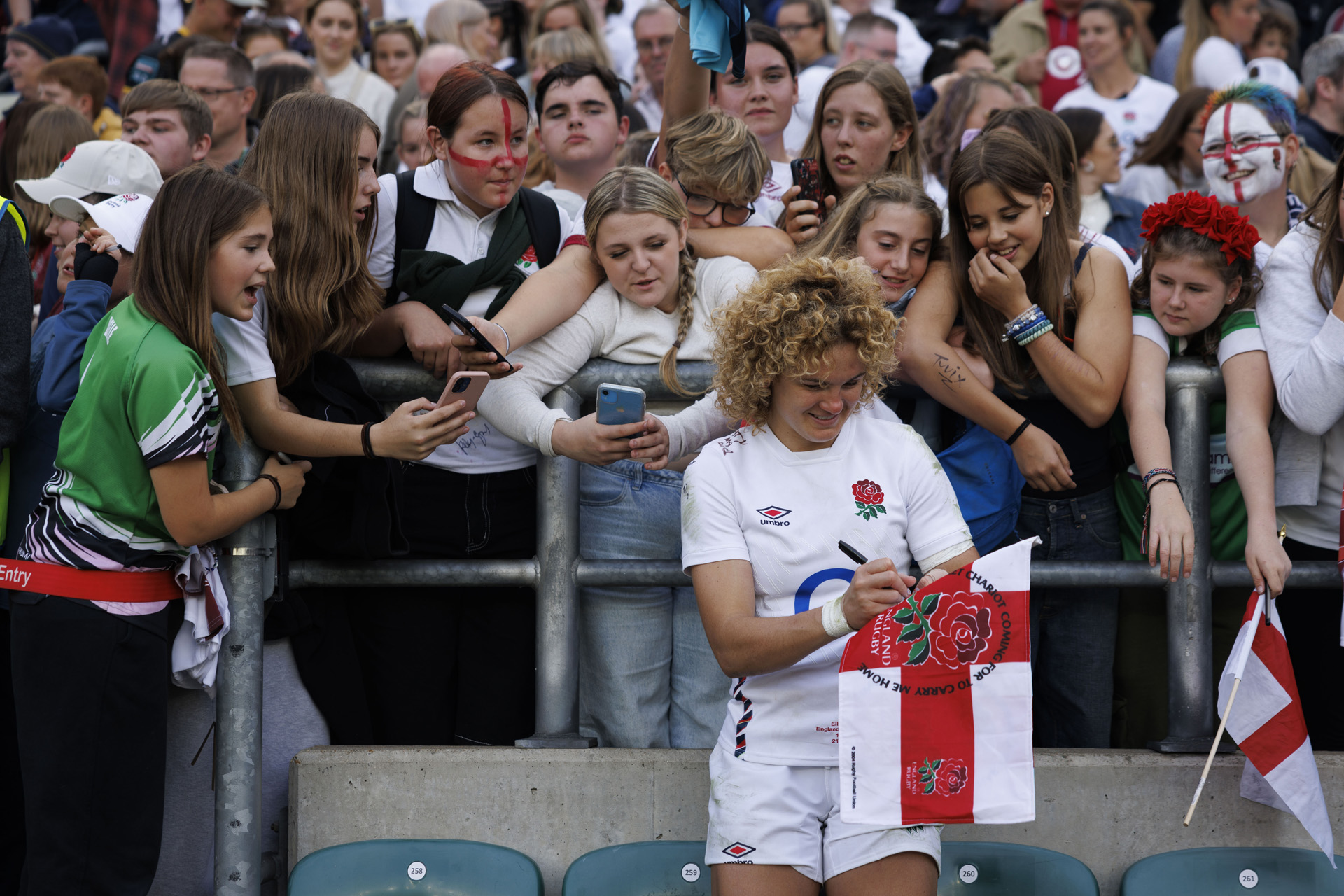 England’s Ellie Kildunne interacts with fans after the Women's International Test between England Red Roses and New Zealand Black Ferns at Allianz Stadium on September 14, 2024 in London, England