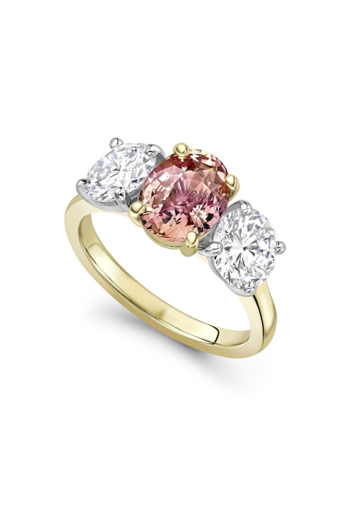 Ring with light pink stone