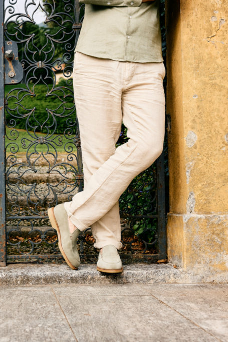 Man leaning against wall | Crockett & Jones Spring/Summer 2025