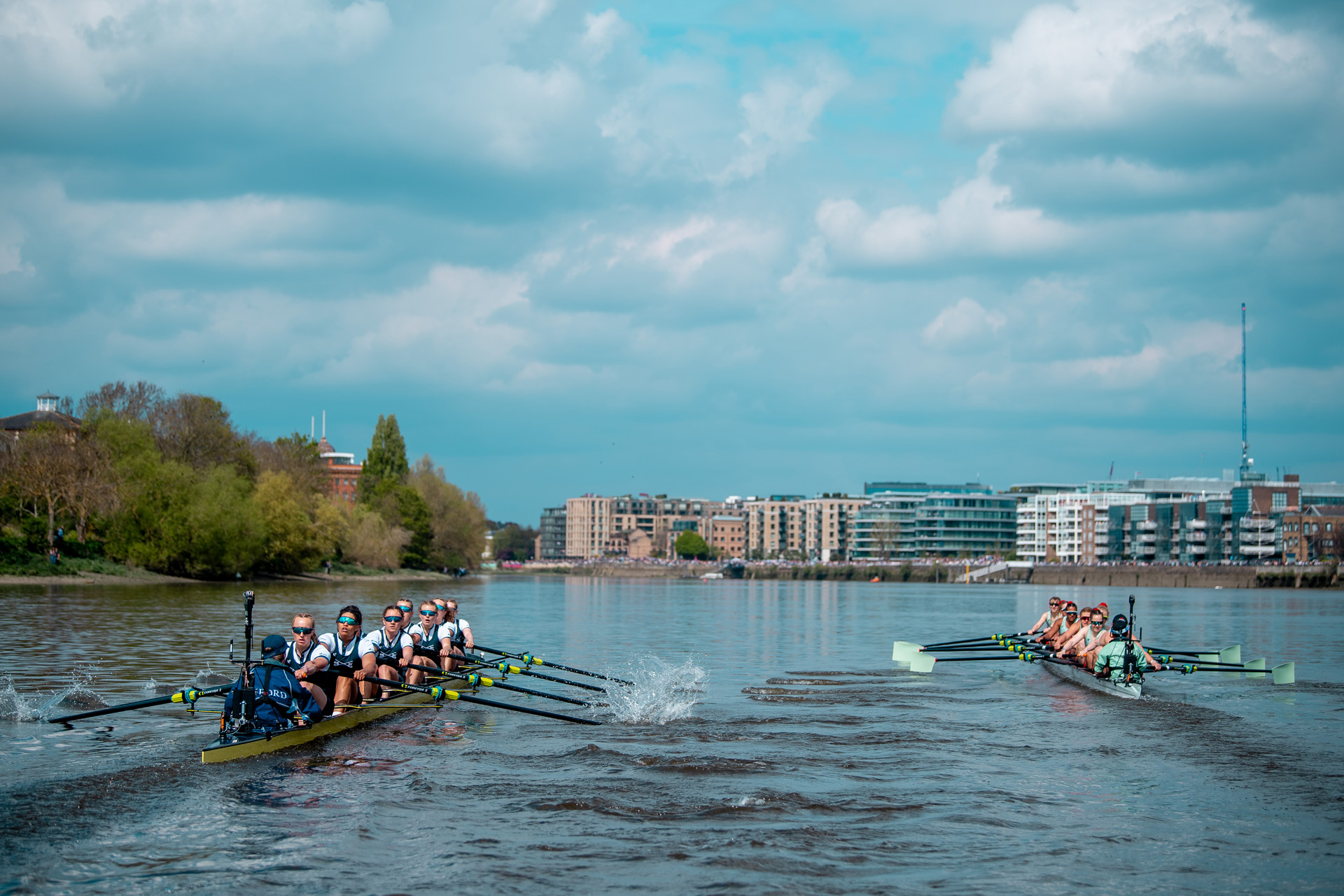 Oxford and Cambridge rowing side by side in The Boat Race