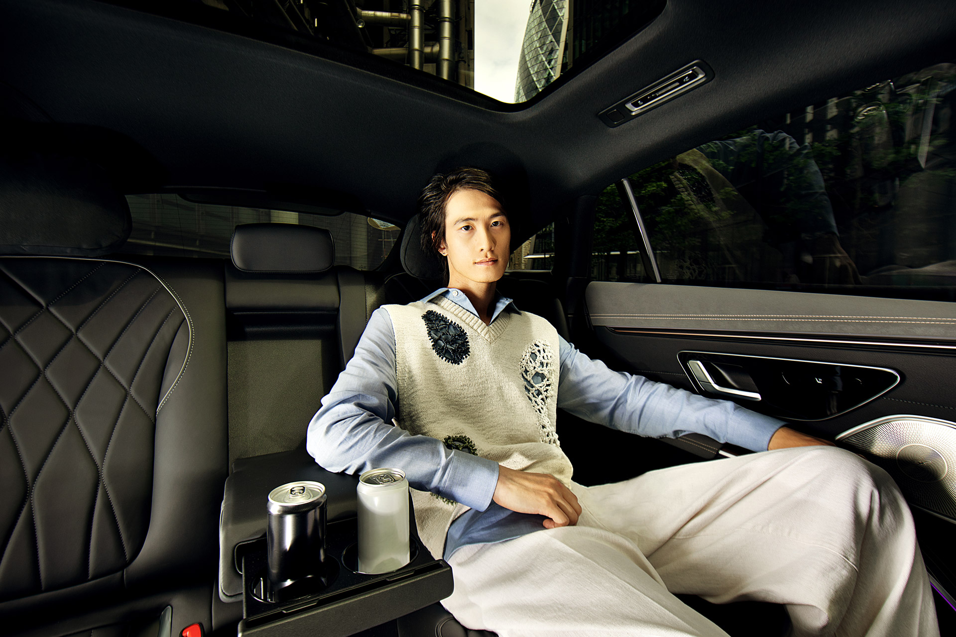Man sitting in a luxury car