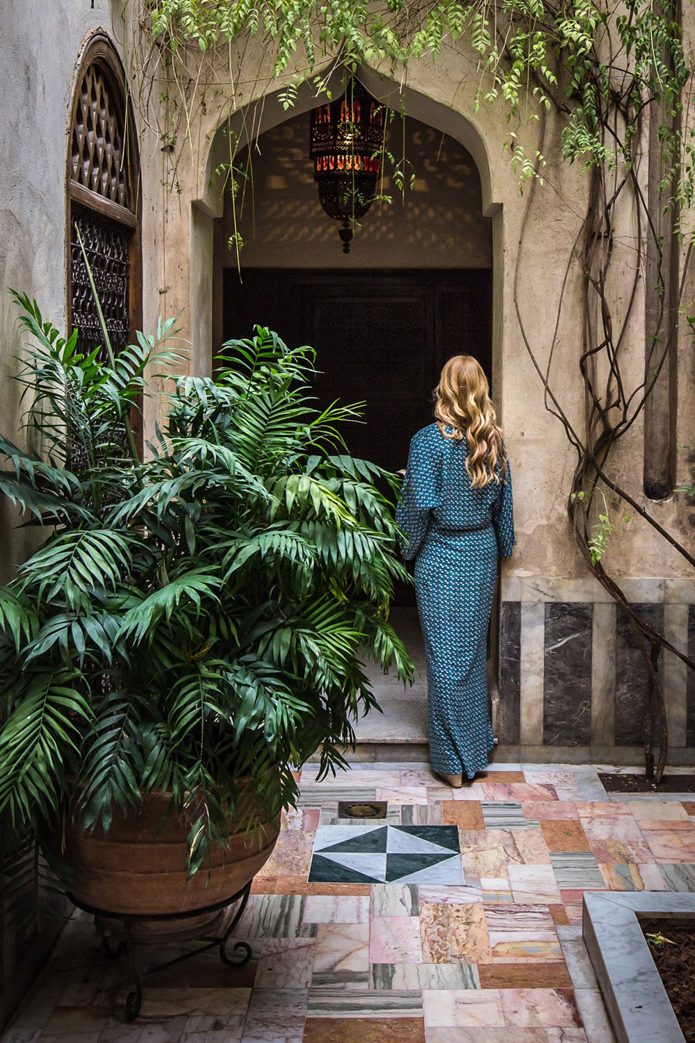 Woman walking in a hotel
