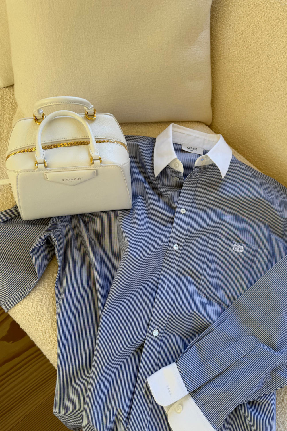 Clothes laid out on sofa